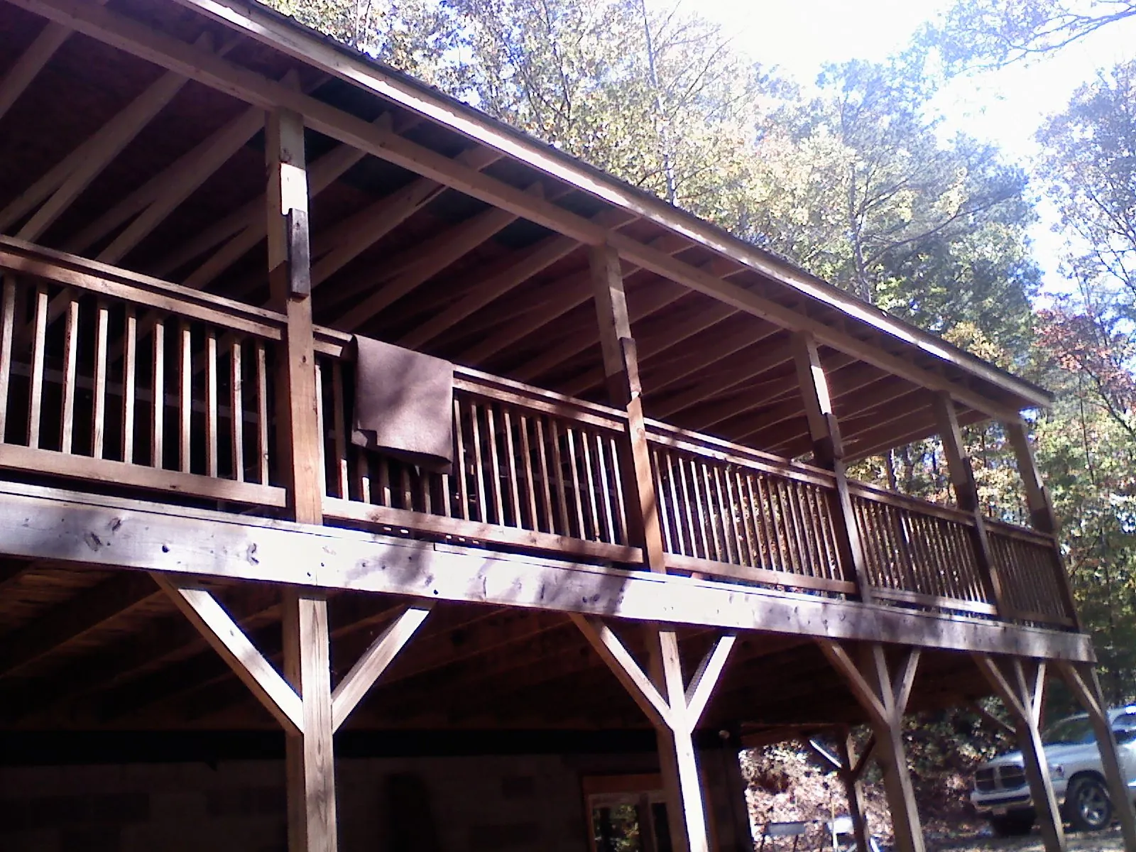 Timber framing under a new elevated porch and deck — Roof Leak Repair in Grandy by Roofing Brothers